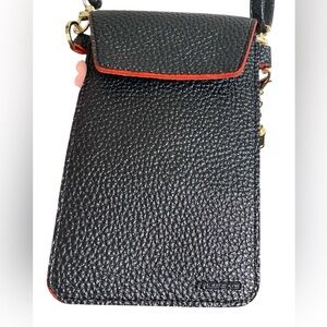 Chic Black and Red Crossbody Bag with Minimalist Design